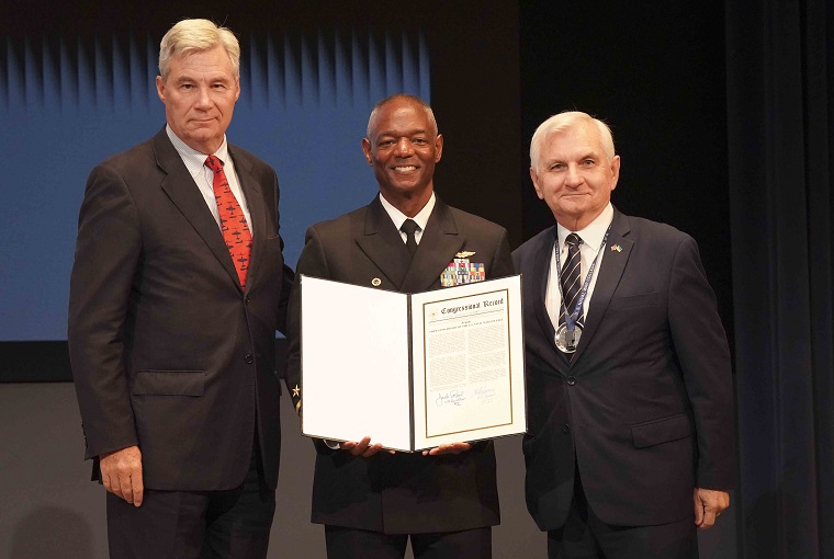 Rear Adm. Darryl L. Walker, Sen. Jack Reed, D-R.I., Sen. Sheldon Whitehouse, D-R.I. at the 140th Naval War College anniversary.