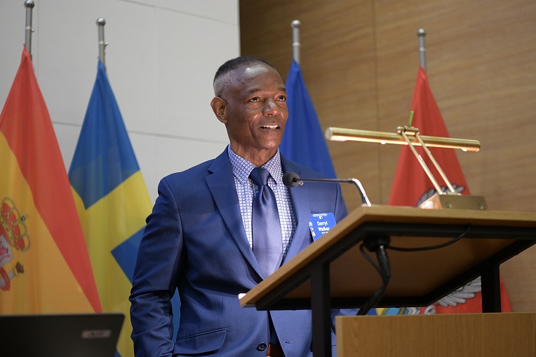 U.S. Naval War College President Rear Adm. Darryl Walker speaking.