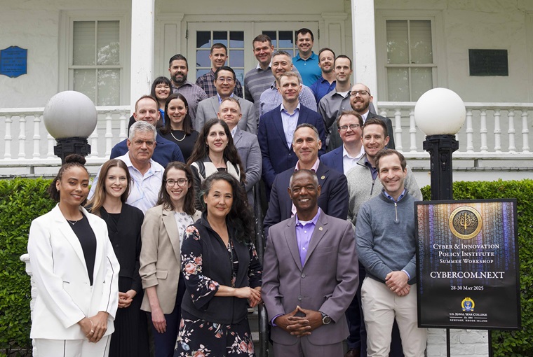 Participants attending the fourth annual Adm. James R. Hogg Cyber and Innovation Policy Institute (CIPI) Summer Workshop at the U.S. Naval War College (NWC) pose for a photo onboard Naval Station Newport, May 29, 2025.