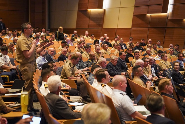 A U.S. Naval War College (NWC) student asks retired Adm. James G. Foggo, dean of the Center for Maritime Strategy, a question during the 74th Current Strategy Forum (CSF) onboard Naval Station Newport, June 9, 2025.