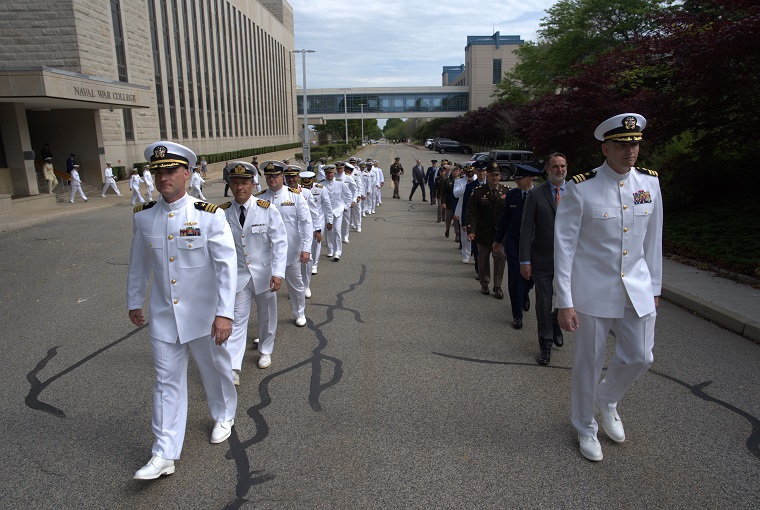 Student walking towards their graduation ceremony