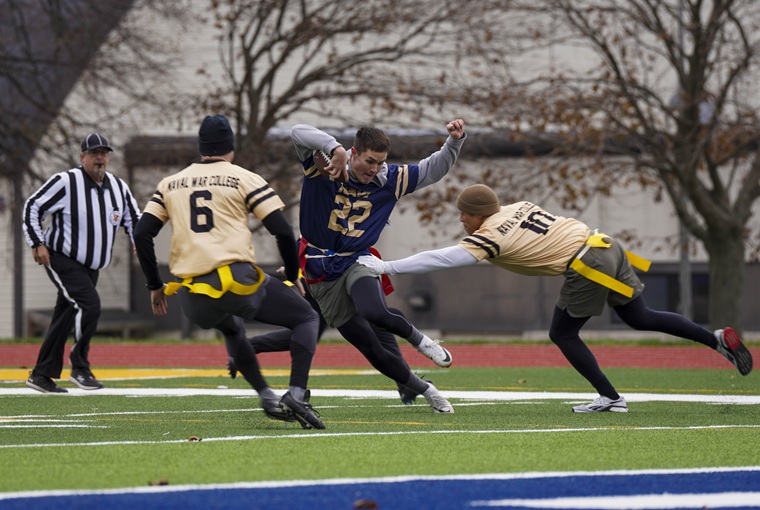 The U.S. Naval War College held its annual Army-Navy flag football game on Friday, Nov. 21, ahead of a lecture about the sport’s history, as well as the war college’s connection to its growth more than a century ago.
