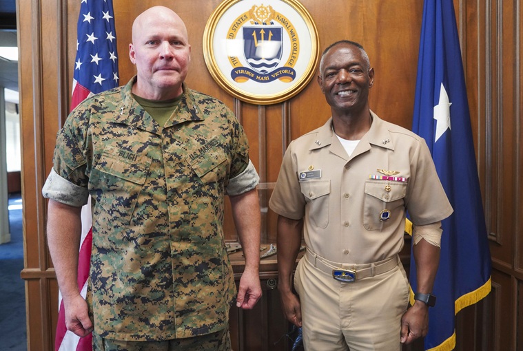 U.S. Naval War College (NWC) President Rear Adm. Darryl Walker met with U.S. Marine Corps Maj. Gen. David J. Bligh, Judge Advocate General of the Navy, at the war college’s Newport, Rhode Island, campus on Aug. 25.