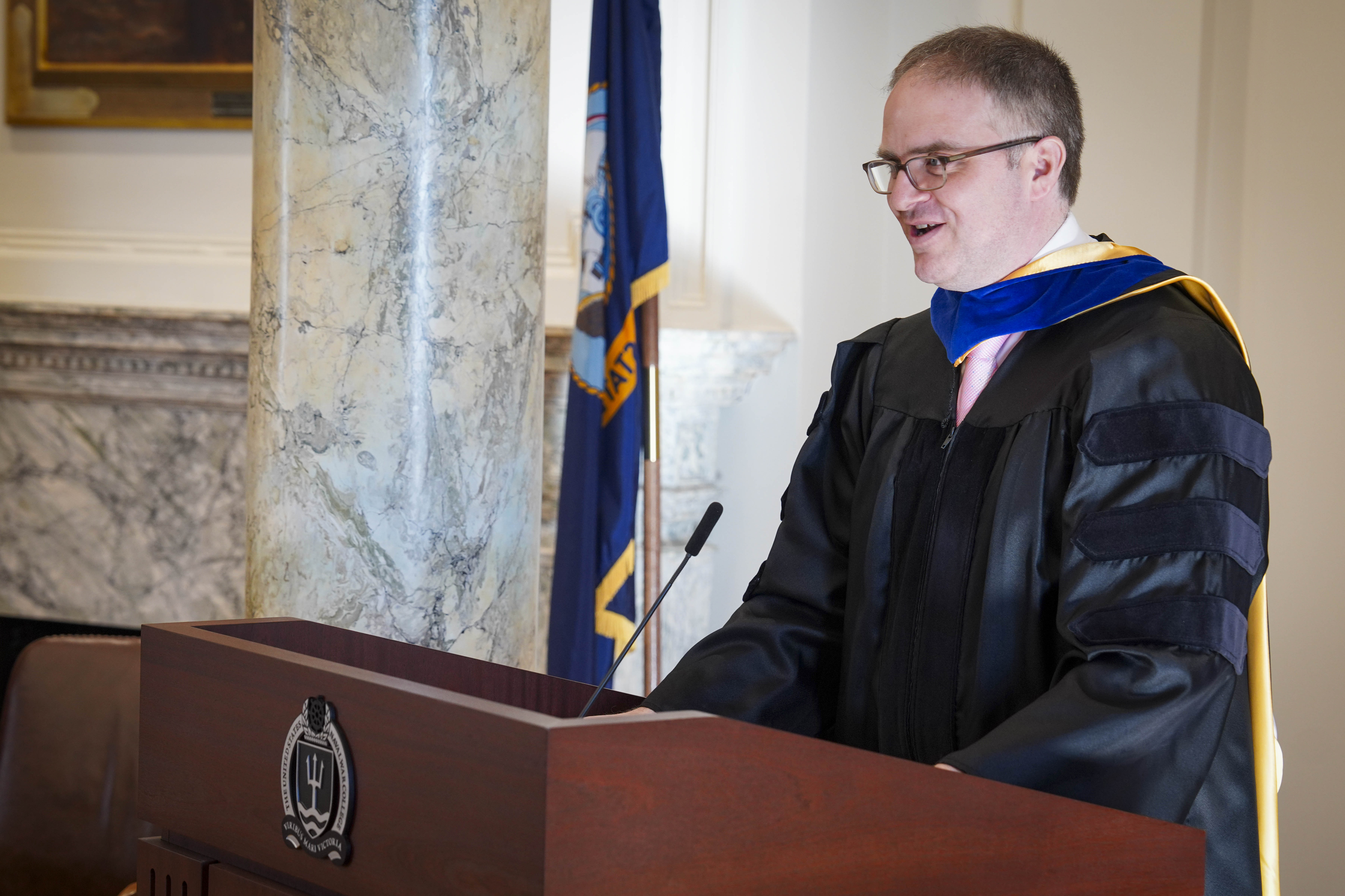 Dr. Curtis Bell, Capt. Jerome E. Levy Chair of Economic Geography and National Security and director of the Maritime Security and Governance Staff Course, spoke at the ceremony.