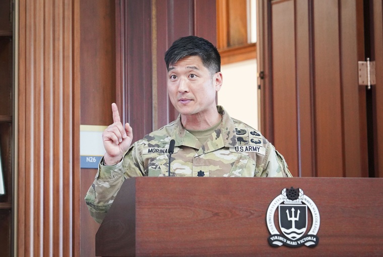 Army speaker at a podium