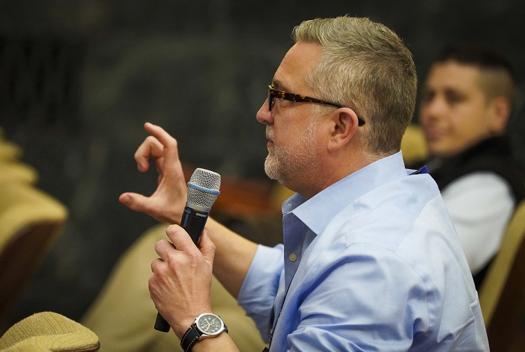A man with a microphone