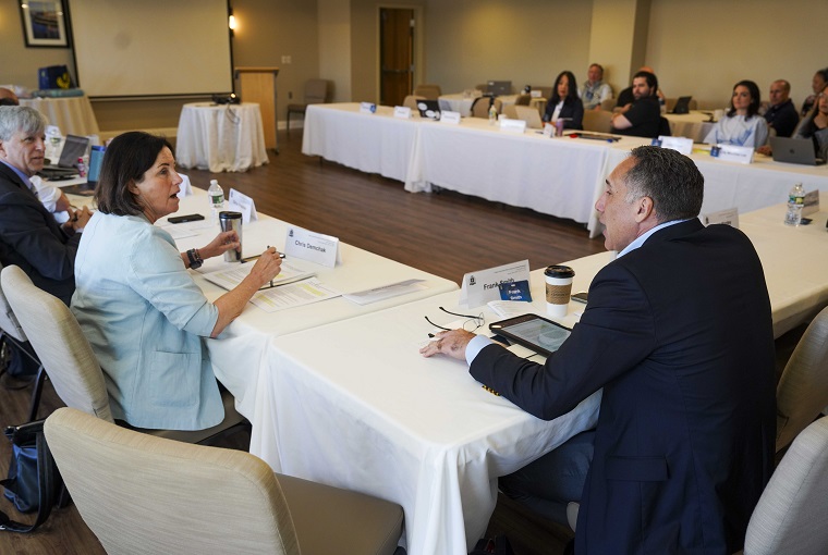 People discussing at a conference