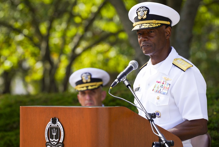 A man speaking at a podium