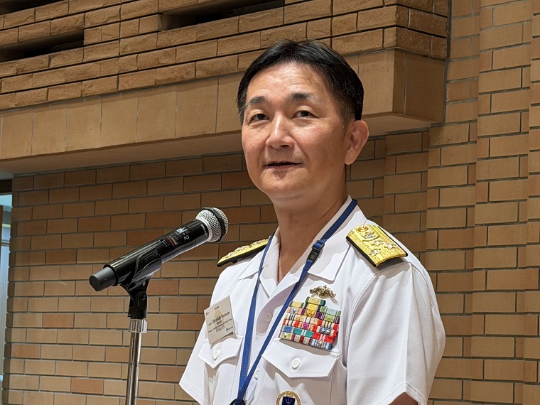 A man at a microphone