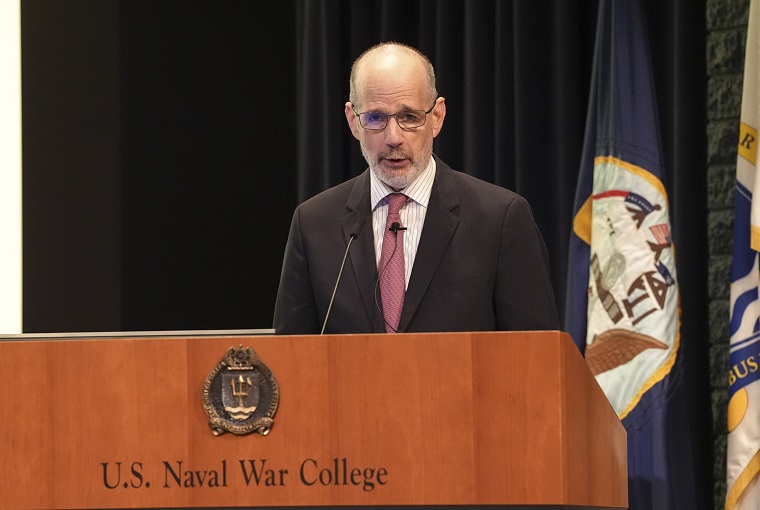 A man speaking at a podium
