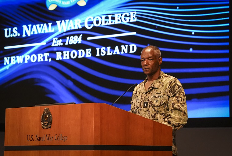 A man speaking at a podium