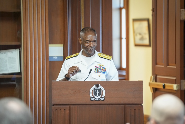 A man speaking at a podium