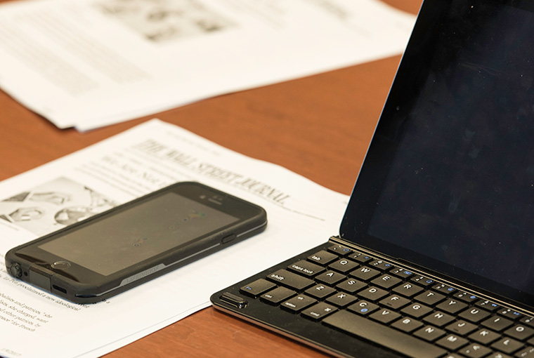 Laptop and phone students use in class.