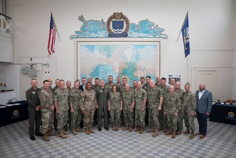 Chief of Naval Operations Adm. Lisa Franchetti and Master Chief Petty Officer of the Navy James Honea pose for a photo with senior officers and civilians at the CNO Futures Game at Naval Station Newport, Rhode Island, July 16, 2024.