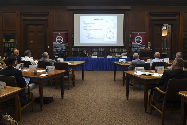 James Giordano, Georgetown University, Washington, D.C. gives a presentation at a symposium hosted by the Center for Irregular Warfare and Armed Groups at the school in Newport, Rhode Island. 