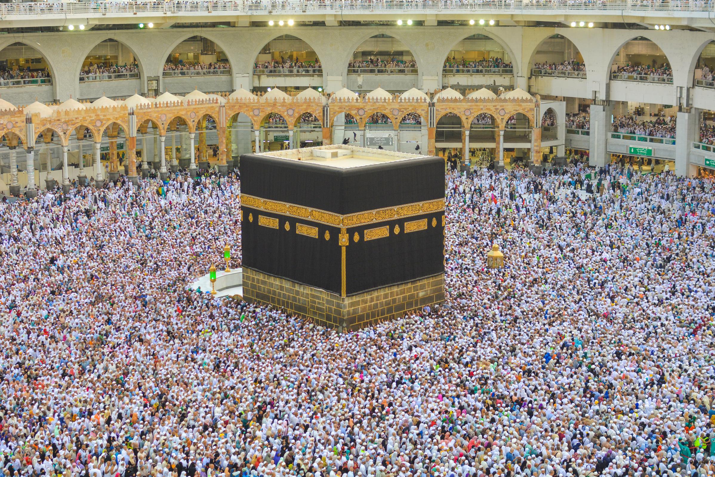 The Kaabah (Kaaba) is located in the Masjid Al-Haram in Makkah (Mecca, Saudi Arabia). This photo was taken during the 2018 Hajj Season. Performing hajj is one of the pillars of Islam and required once for those who can afford to do it. Here the hajj pilgrims are performing the 'tawaf' around the Kaabah.