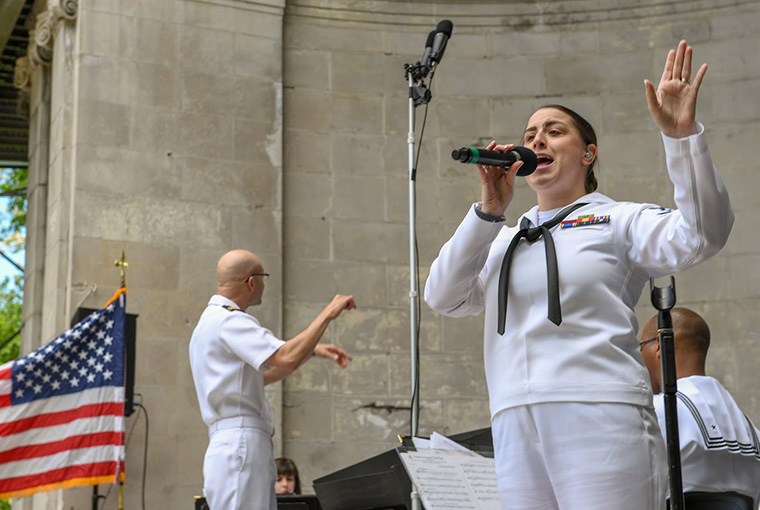 Musician 2nd Class Rachel Vennel sings with Navy Band Northeast's Pops Ensemble during a performance in Central Park in support of Fleet Week New York, 2019.