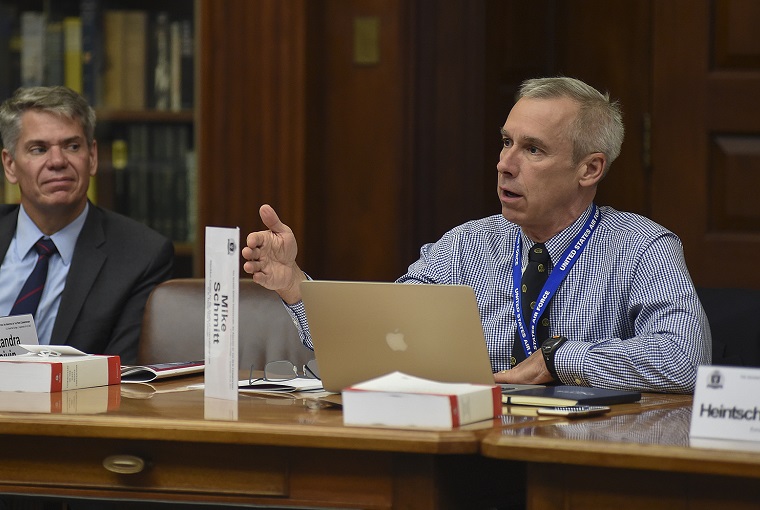 Christopher Harland, a legal advisor with the International Committee of the Red Cross (ICRC) and Michael Schmitt, professor, U.S. Naval War College’s (NWC) Stockton Center for the Study of International Law, participate in a discussion during a legal conference held at NWC.