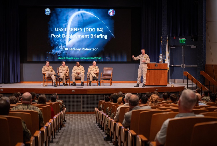 Cmdr. Jeremy Robertson, also delivering a lecture to NWC and SWSC staff, faculty and students; U.S. Naval Academy midshipmen; and personnel from other local commands, in NWC’s Spruance Auditorium.