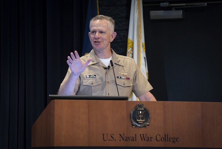 Vice Adm. Daniel Dwyer, Deputy Chief of Naval Operations for Warfighting Development, addressing the audience.