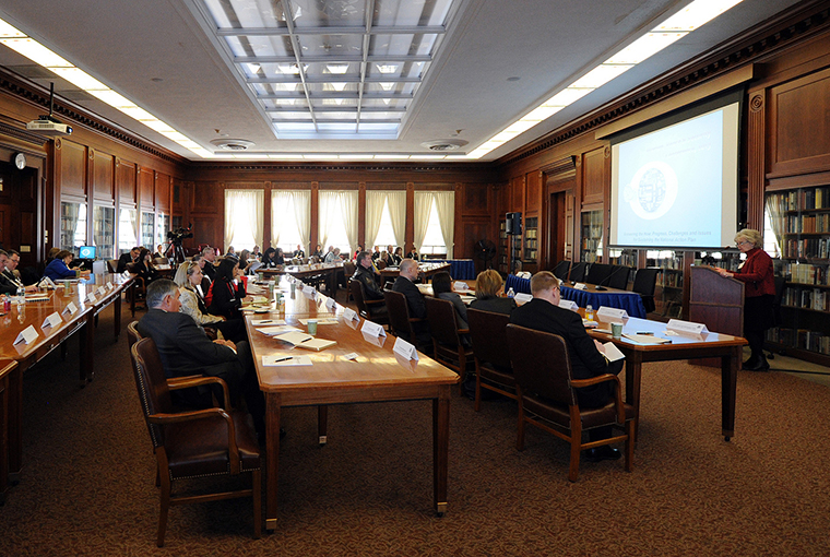 Retired Ambassador Mary Carlin Yates addresses participants of the Women, Peace and Security conference in Mahan Hall at U.S. Naval War College (NWC) in Newport, R.I.