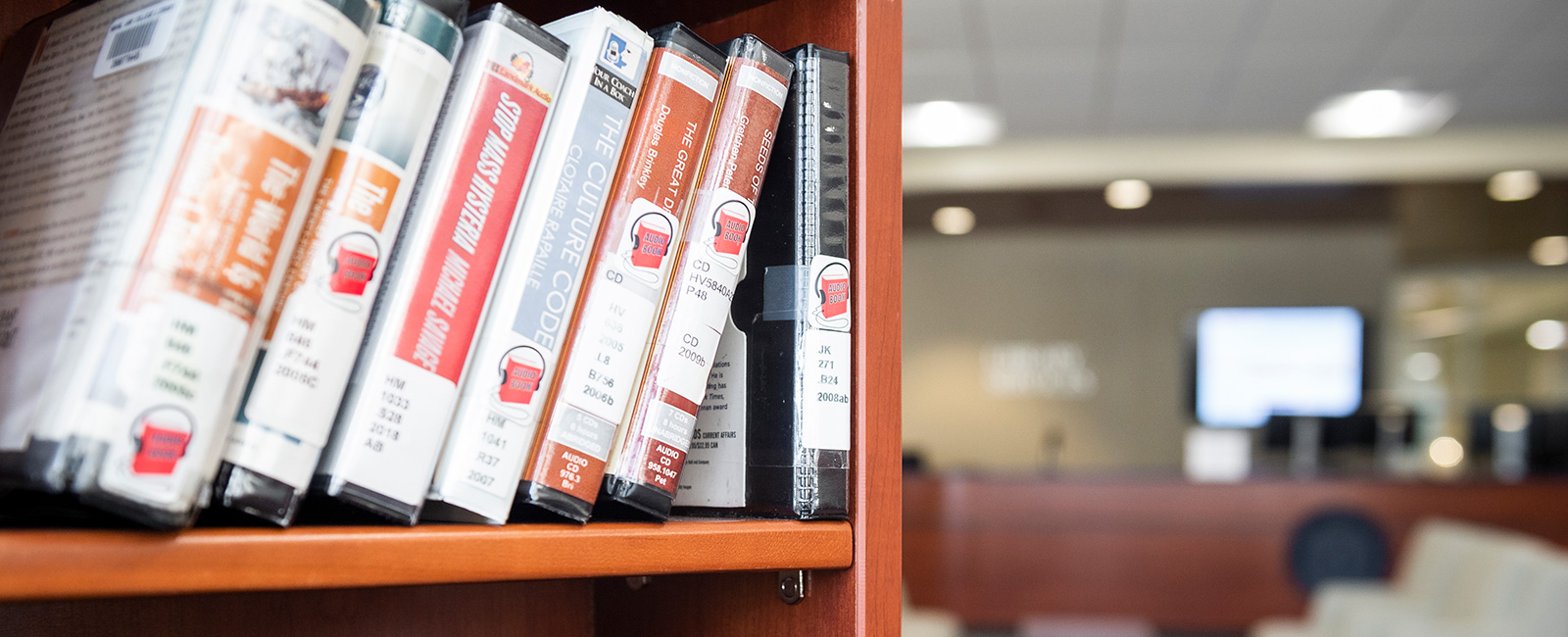Books on a shelf in the Learning Commons