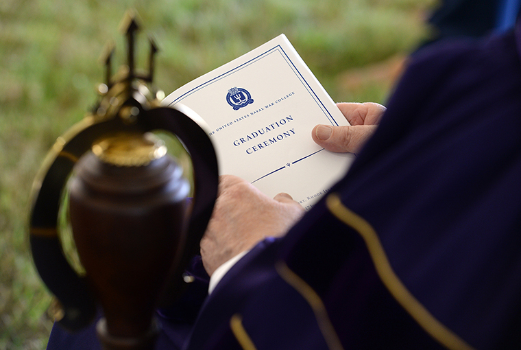 A U.S. Naval War College (NWC) faculty member participates in a graduation ceremony at NWC in Newport, Rhode Island.