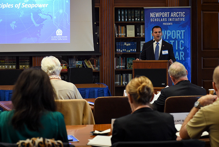 Walter Berbrick, associate professor, U.S. Naval War College’s (NWC) Wargaming Department, gives a keynote address during the Newport Arctic Scholars Initiative (NASI) held at NWC’s Mahan Reading Room. 