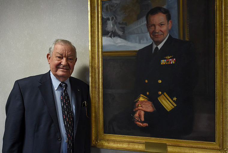 Retired Rear Adm. Ronald J. Kurth, U.S. Naval War College (NWC) president from Aug. 1987 until July 1990, stands aside his official portrait in Conolly Hall at NWC