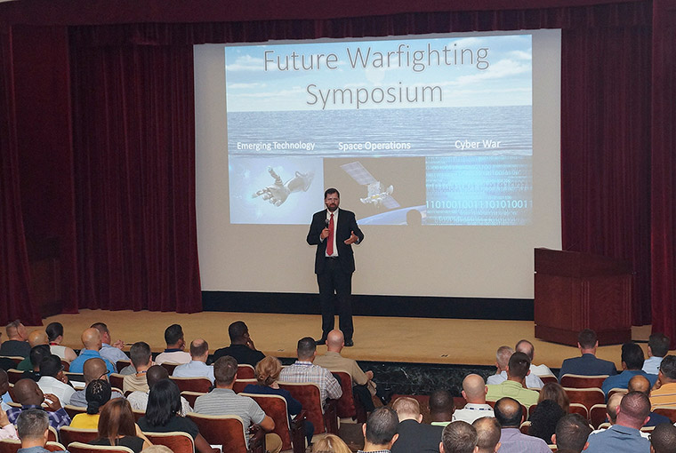 Phil Haun, dean of academics at U.S. Naval War College (NWC), speaks during NWC’s inaugural Future Warfighting Symposium held at NWC.