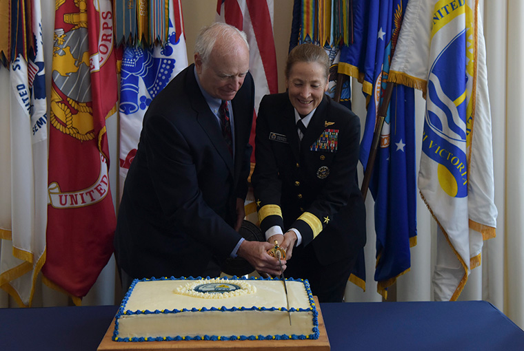 Rear Adm. Shoshana S. Chatfield, president, U.S. Naval War College (NWC), and former president retired Rear Adm. James Stark cut a cake in celebration of NWC’s 135th anniversary, Oct. 7.