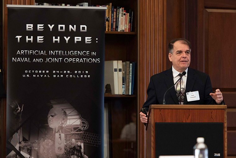 Samuel Tangredi, professor, U.S. Naval War College (NWC), delivers an opening speech during the “Beyond the Hype: Artificial Intelligence in Naval and Joint Operations” conference at NWC, Oct. 24.