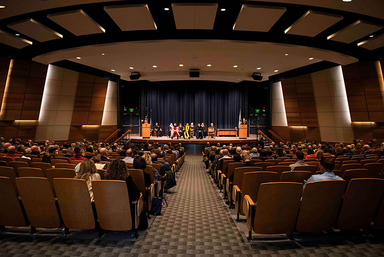 Rear Adm. Shoshana Chatfield, president, U.S. Naval War College, gives a speech during a graduation ceremony held at Spruance Auditorium on Nov. 13. Forty students graduated during the ceremony. 