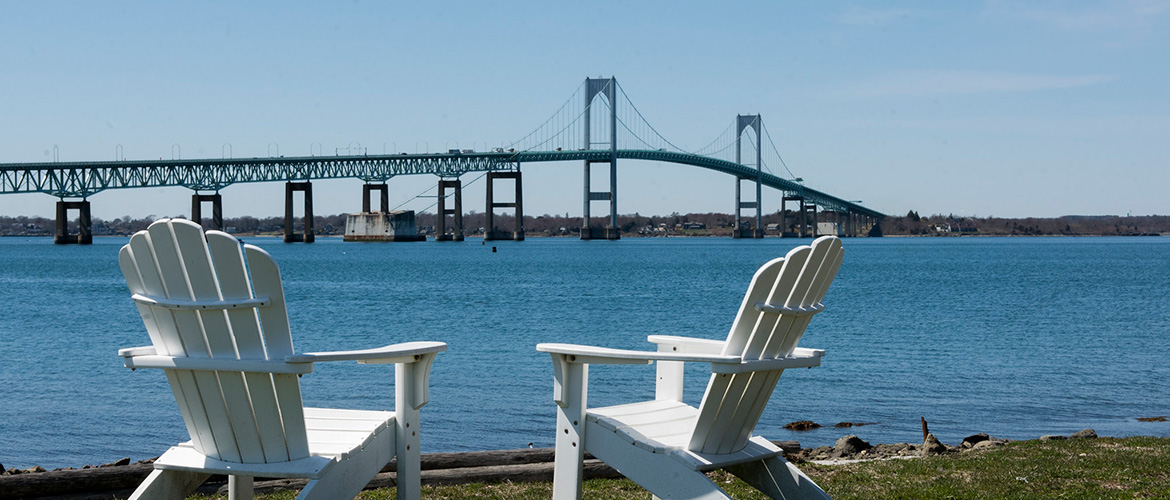 U.S. Naval War College lawn with chairs overlooking the water.