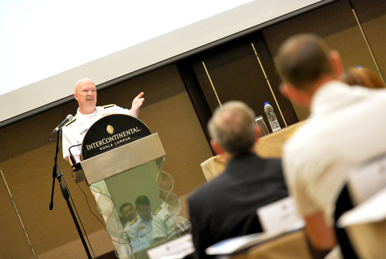 Photo of Rear Adm. Jeffrey A. Harley, president of U.S. Naval War College (NWC) in Newport, Rhode Island, welcoming participants of NWC’s 16th Regional Alumni Symposium held in the Malaysian capital of Kuala Lumpur. 
