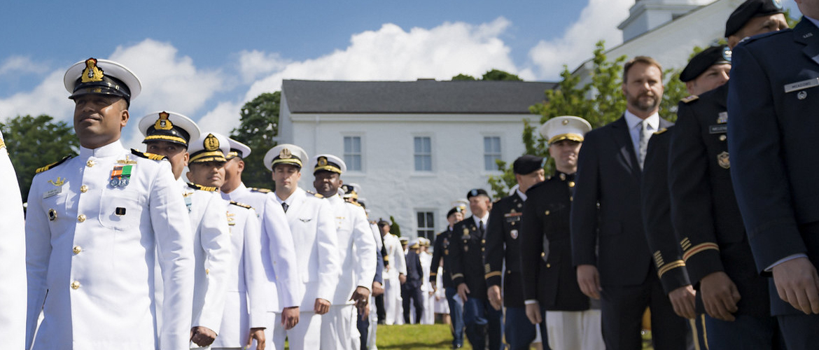 Students of U.S. Naval War College’s (NWC) 2019 graduating class participate in a commencement ceremony on Dewey Field in Newport, R.I., June 14.