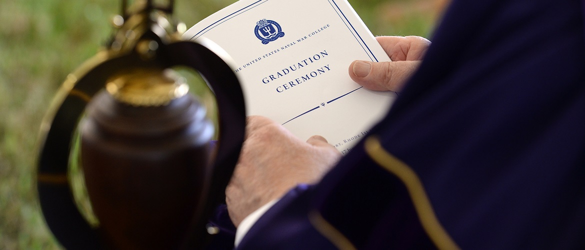 A U.S. Naval War College (NWC) faculty member participates in a graduation ceremony at NWC in Newport, Rhode Island. 