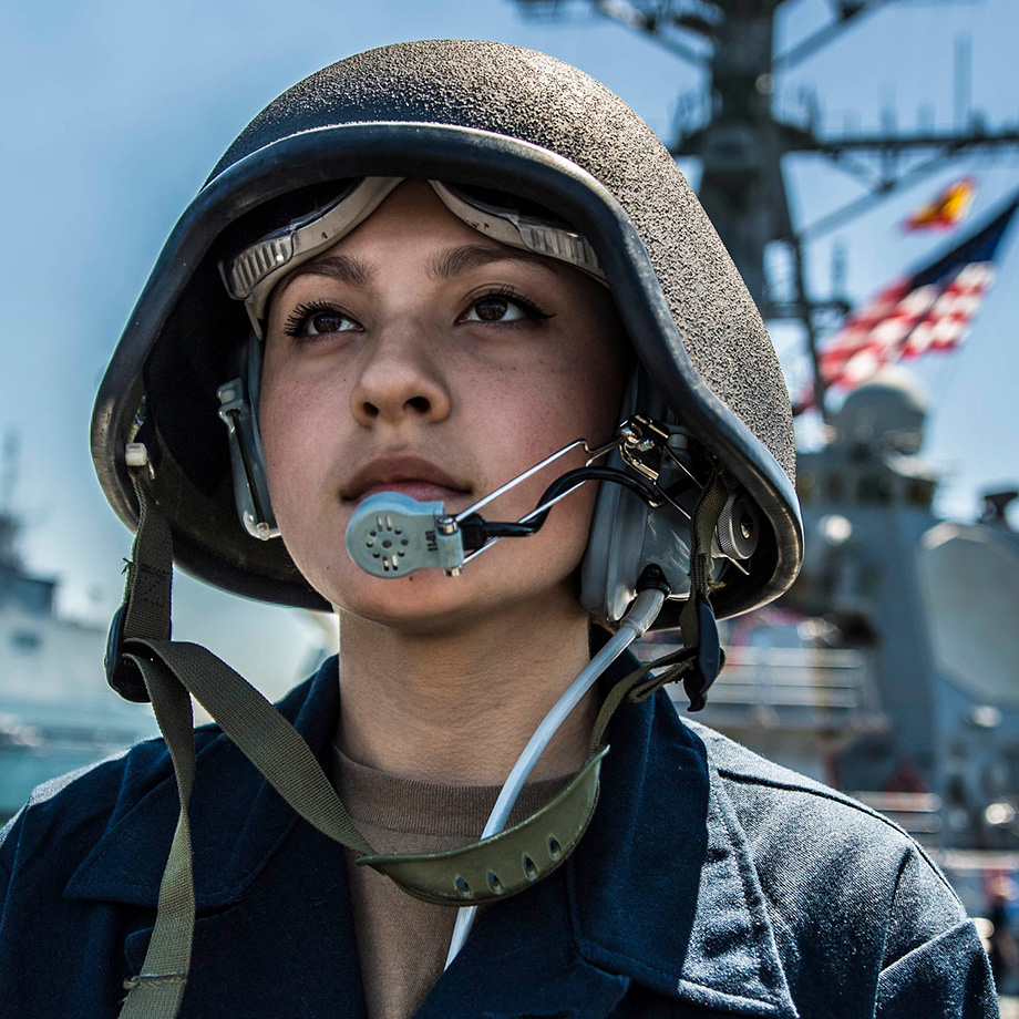 Boatswain's Mate Seaman Alyssa Mullinax stands watch as a phone talker aboard the Arleigh Burke-class guided-missile destroyer USS Porter (DDG 78) while arriving at Naval Station Rota, Spain, April 14, 2019.