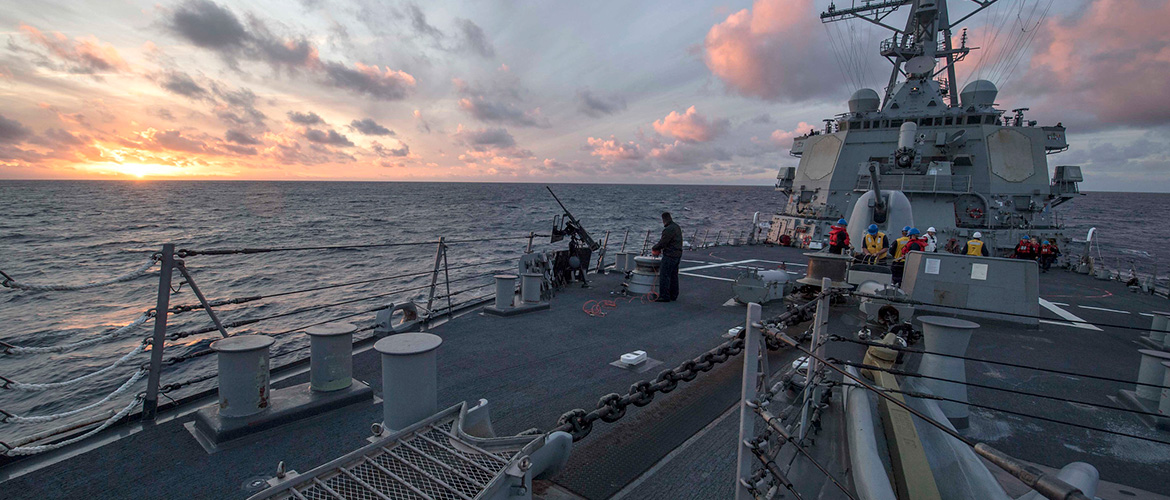 Sailors assigned to the Arleigh Burke-class guided-missile destroyer USS Carney (DDG 64) secure gear following a replenishment-at-sea with the Henry J. Kaiser-class fleet replenishment oiler USNS Kanawha (T-AO 196), Nov. 17, 2019.