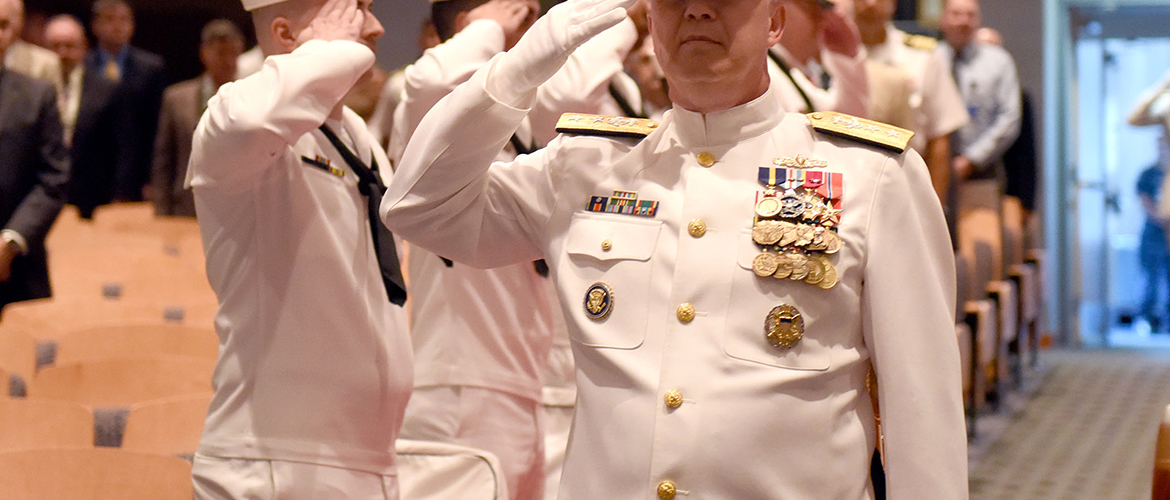 Rear Adm. Jeffrey A. Harley arrives at a change of command ceremony at U.S. Naval War College in Newport, Rhode Island.