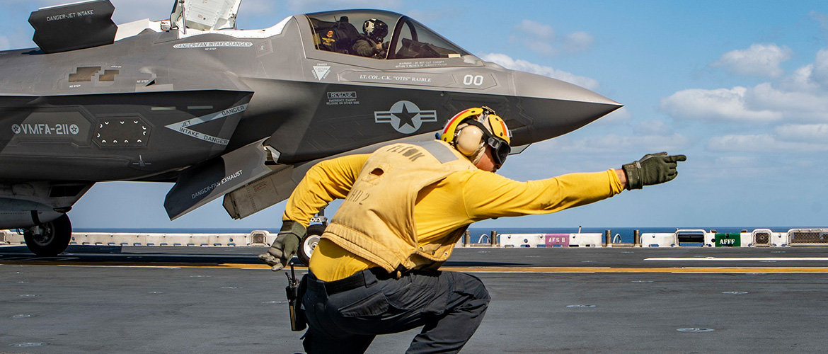Aviation Boatswain’s Mate (Handling) 1st Class Danrey White launches an F-35B Lightning II.